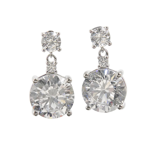 Pair of zircon earrings on a white background