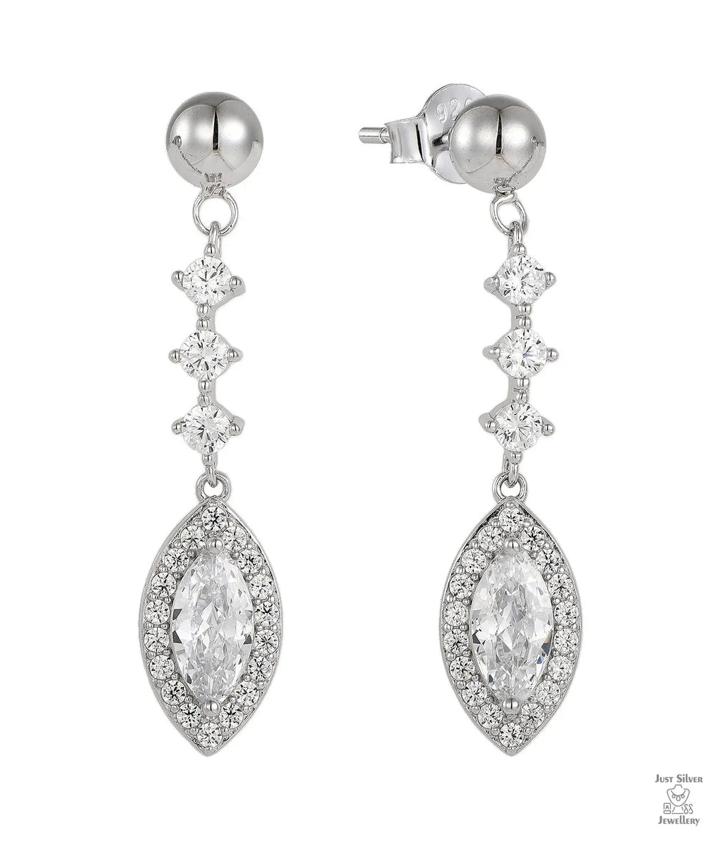 Silver earrings with natural zircon gemstones on a white background