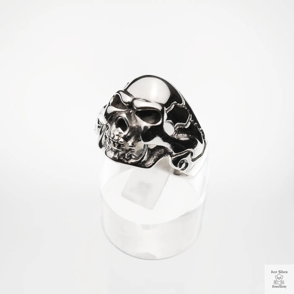 Silver skull ring on a white background