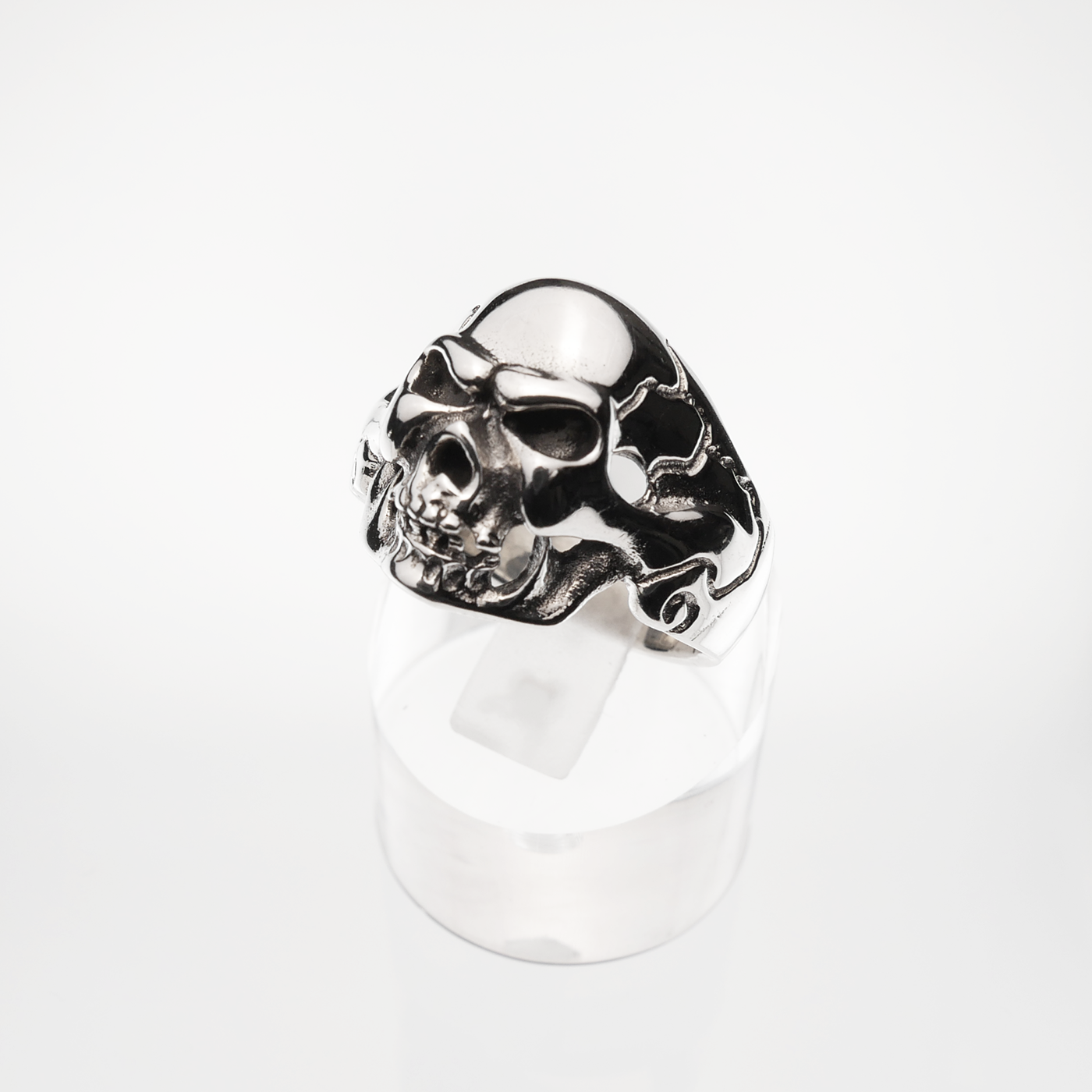 Silver skull ring on a white background