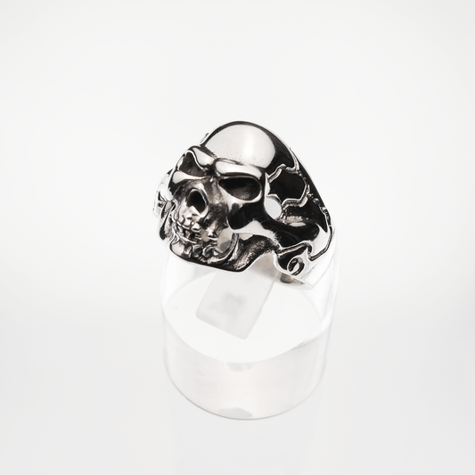 Silver skull ring on a white background