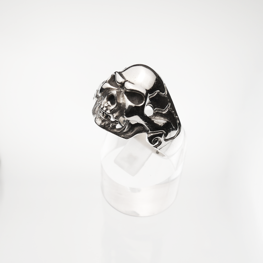 Silver skull ring on a white background