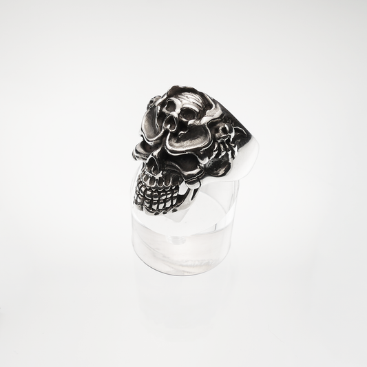 Silver skull ring on a white background