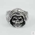 Silver skull design on a white background
