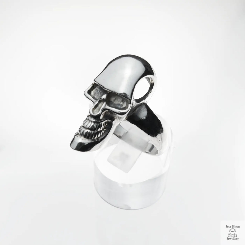 Silver skull ring on a white background