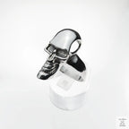 Silver skull ring on a white background