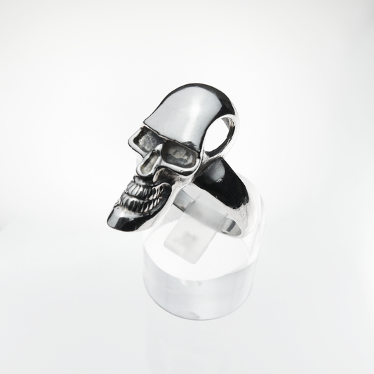 Silver skull ring on a white background