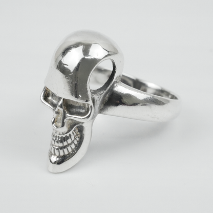 Silver skull ring on a white background