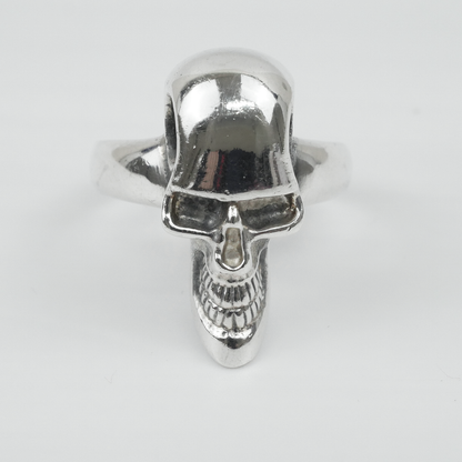 Silver skull ring on a white background
