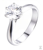 Silver ring with a large zircon on a white background