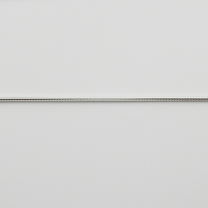 Light gray color swatch with a thin silver line
