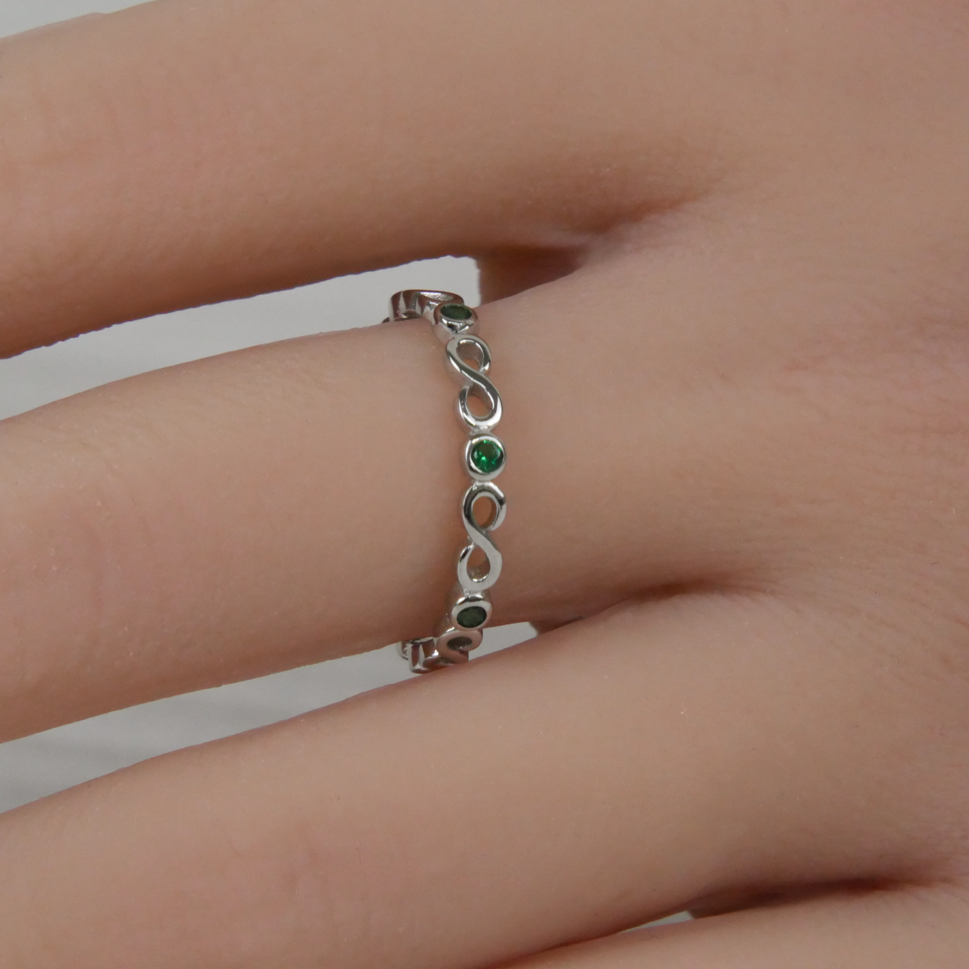 Silver Infinity Loops Delicate Emerald Zirconia Ring