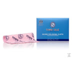 A blue box of Town Talk Silver Polishing Cloth with a pink cloth partially unwrapped and showing the brand and product name.